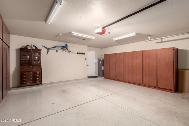 garage featuring a garage door opener and water heater