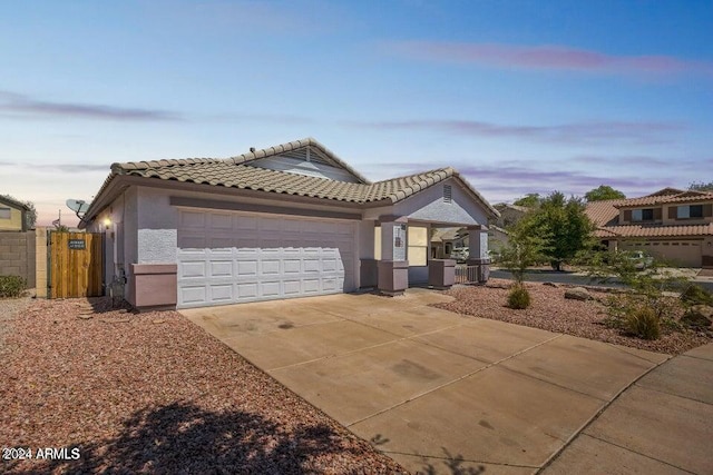 view of front of property featuring a garage