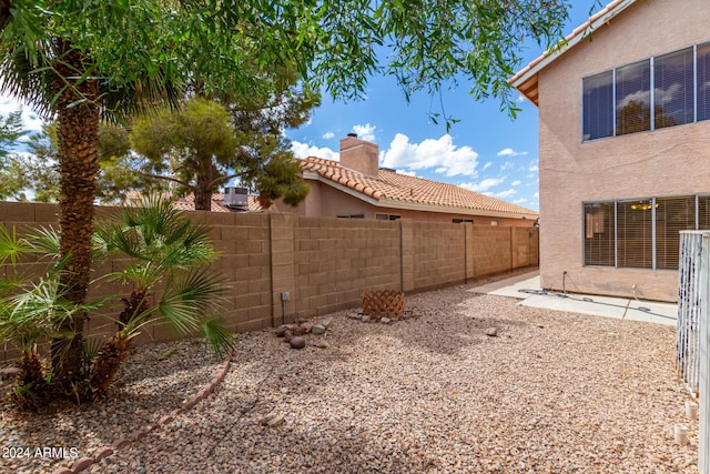 view of yard featuring a fenced backyard and a patio area