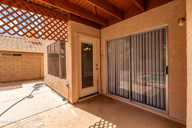 view of patio / terrace featuring fence