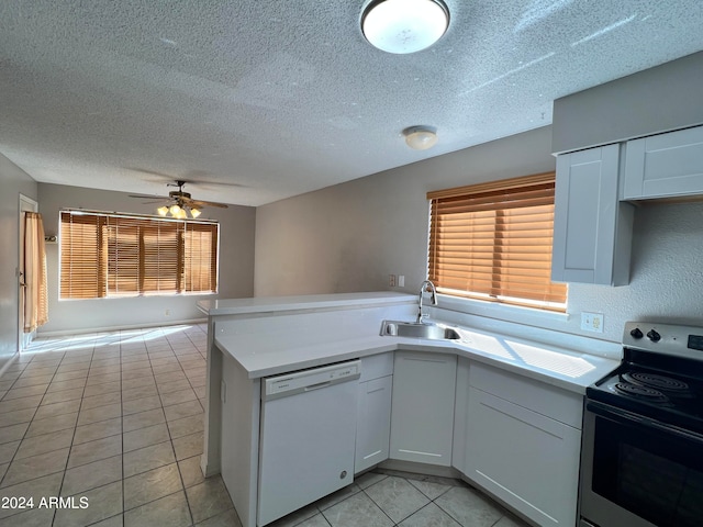 kitchen with dishwasher, sink, white cabinets, electric stove, and ceiling fan