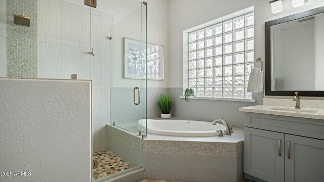 122 E Desert Wind Dr, Phoenix, AZ 85048 - full bathroom featuring visible vents, vanity, a shower stall, and a bath