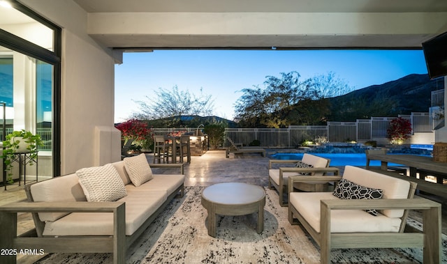 122 E Desert Wind Dr, Phoenix, AZ 85048 - view of patio / terrace with fence, an outdoor living space, a fenced in pool, and outdoor dining space