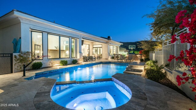 122 E Desert Wind Dr, Phoenix, AZ 85048 - view of pool featuring a patio, fence, and a pool with connected hot tub