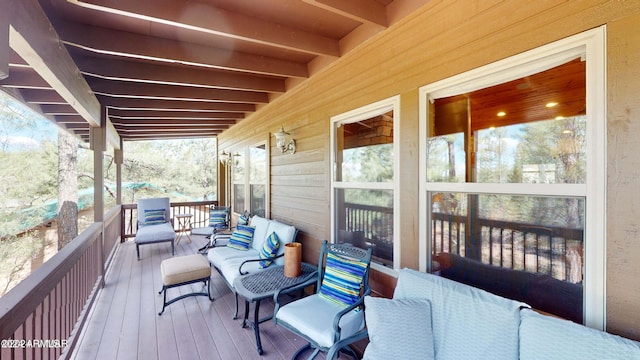 deck with an outdoor hangout area