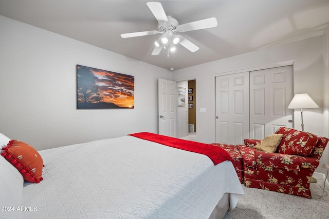 bedroom with ceiling fan, a closet, and carpet floors