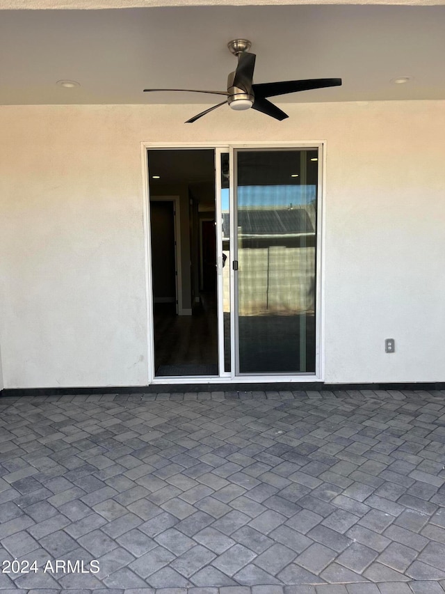 view of patio with ceiling fan