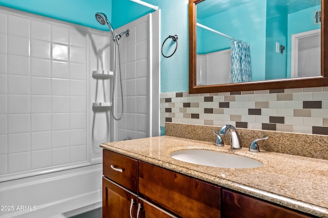 8116 N 55th Dr, Glendale, AZ 85302 - bathroom with vanity, shower / bathtub combination with curtain, and decorative backsplash