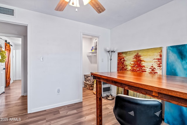 8116 N 55th Dr, Glendale, AZ 85302 - office area with wood finished floors and a ceiling fan