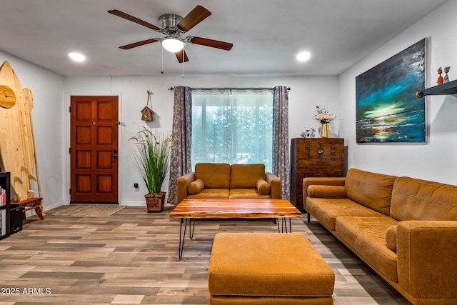 8116 N 55th Dr, Glendale, AZ 85302 - living area featuring wood finished floors, recessed lighting, and a ceiling fan