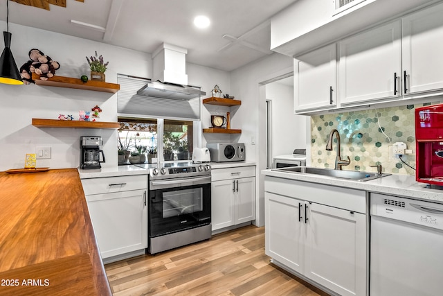 8116 N 55th Dr, Glendale, AZ 85302 - kitchen with electric range, white dishwasher, open shelves, tasteful backsplash, and light wood-type flooring