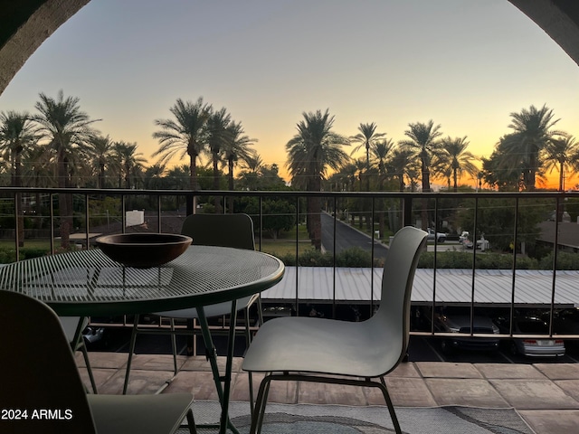 view of patio terrace at dusk