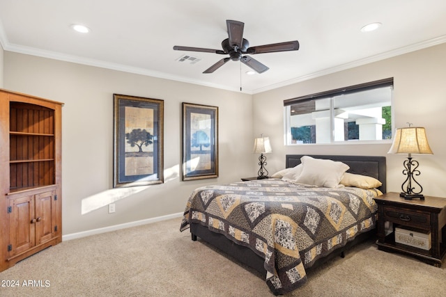 carpeted bedroom featuring ceiling fan and crown molding