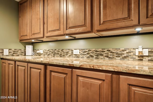 details featuring decorative backsplash