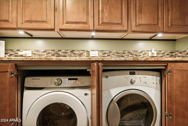 laundry area featuring washer and clothes dryer