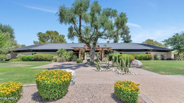 view of front of property with a front lawn