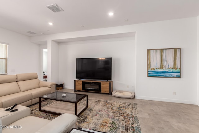 living room with tile flooring