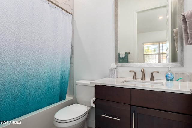 full bathroom featuring vanity, toilet, and shower / tub combo