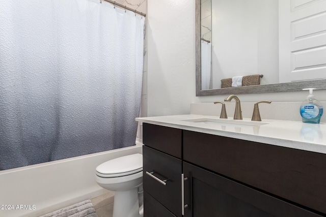 full bathroom with tile floors, shower / bath combination with curtain, toilet, and vanity