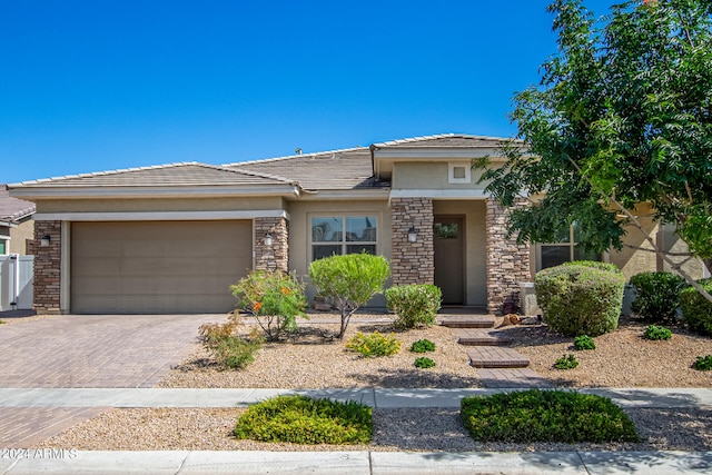 prairie-style home with a garage