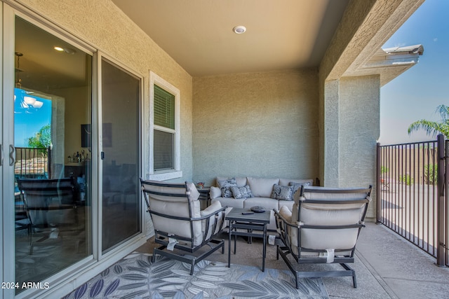 view of terrace with outdoor lounge area and a balcony