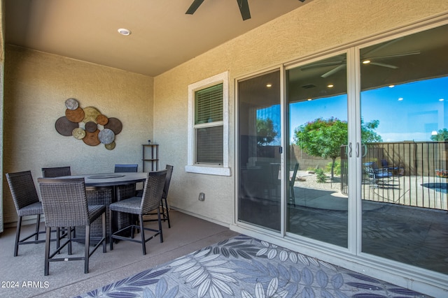 view of patio / terrace featuring ceiling fan