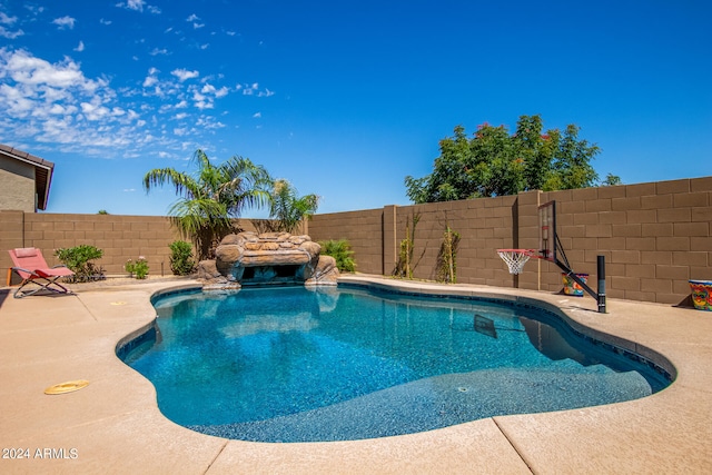 view of pool featuring a patio area and pool water feature