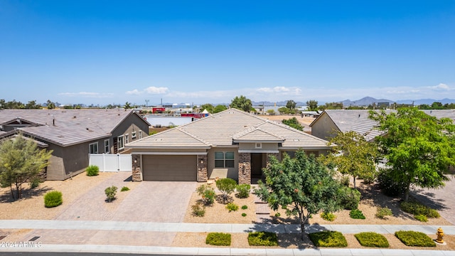 view of front of property featuring a garage