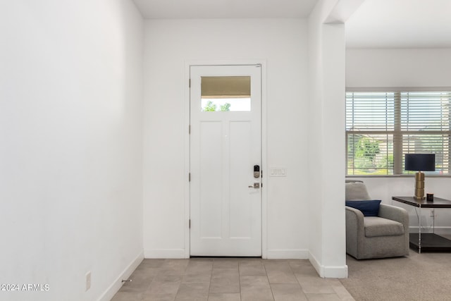 entryway with light tile floors