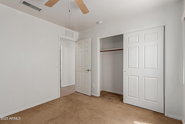 11139 W Devonshire Ave, Phoenix, AZ 85037 - unfurnished bedroom with carpet flooring, a closet, baseboards, and ceiling fan
