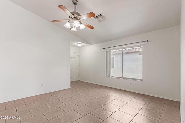 11139 W Devonshire Ave, Phoenix, AZ 85037 - spare room featuring lofted ceiling, ceiling fan, light tile patterned flooring, and baseboards
