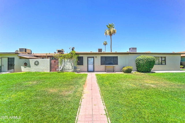 6721 E Mcdowell Rd Unit B309, Scottsdale, AZ 85257 - back of house with a yard