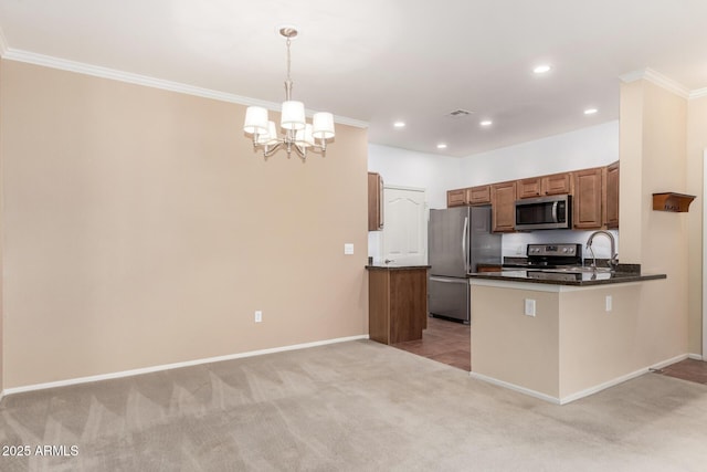 kitchen featuring light carpet, baseboards, ornamental molding, stainless steel appliances, and recessed lighting