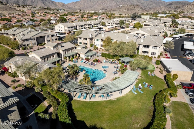 birds eye view of property with a residential view and a mountain view