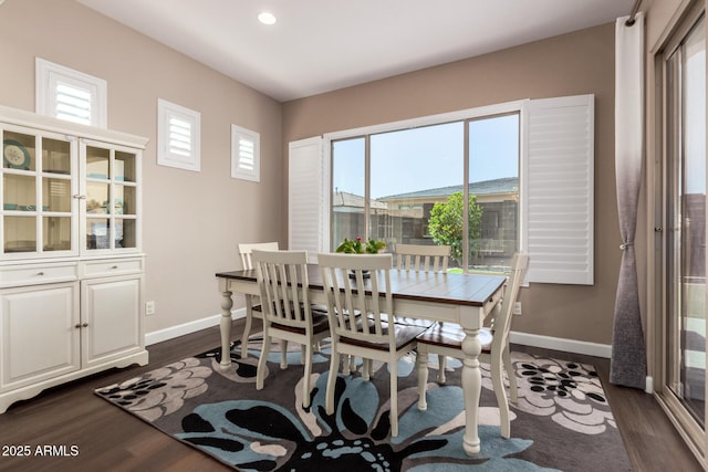 dining room featuring baseboards, dark wood-style floors, plenty of natural light, and recessed lighting