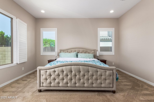 bedroom with carpet flooring, multiple windows, baseboards, and recessed lighting