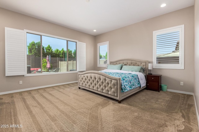 carpeted bedroom with baseboards and recessed lighting