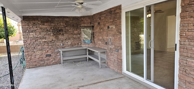 view of patio featuring ceiling fan