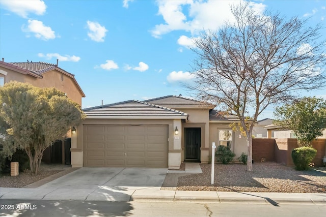 view of front of home with a garage