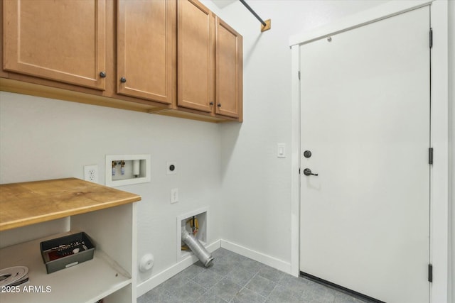 washroom featuring washer hookup, cabinets, hookup for an electric dryer, and hookup for a gas dryer