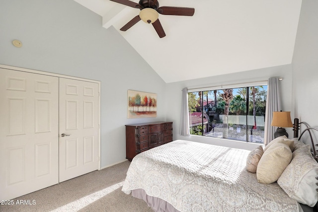 carpeted bedroom featuring high vaulted ceiling, beam ceiling, ceiling fan, and a closet