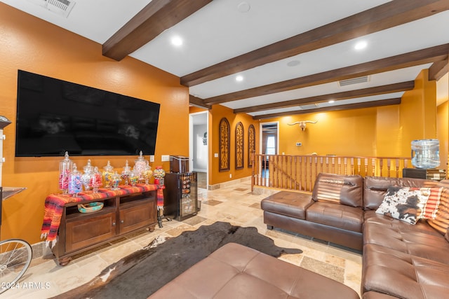 living room with beam ceiling