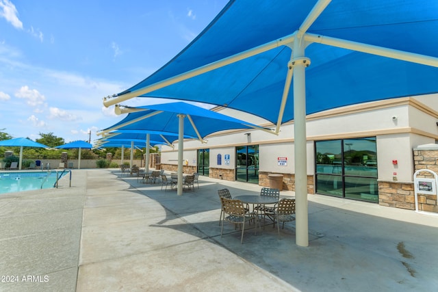 view of patio / terrace with a community pool