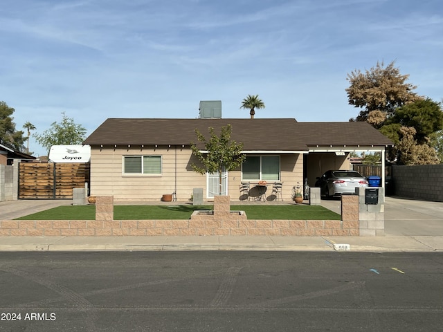538 E Glade Ave, Mesa, AZ 85204 - ranch-style home with driveway and an attached carport