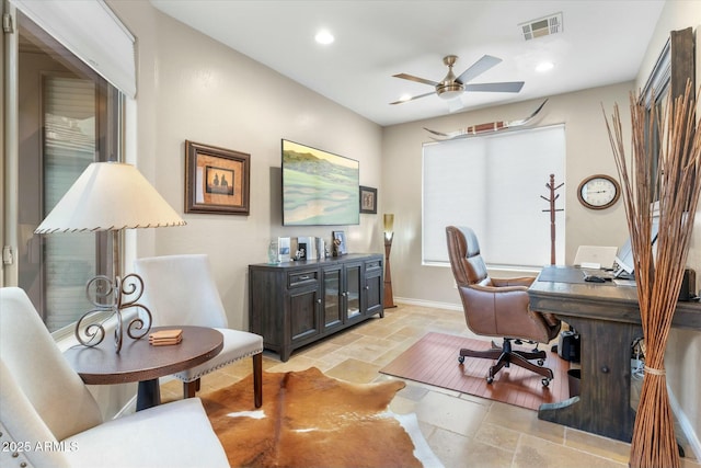 office area with visible vents, baseboards, ceiling fan, stone tile floors, and recessed lighting