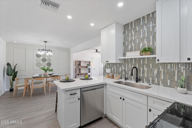 1561 N Sterling St, Mesa, AZ 85207 - kitchen featuring stainless steel dishwasher, a peninsula, white cabinetry, and recessed lighting
