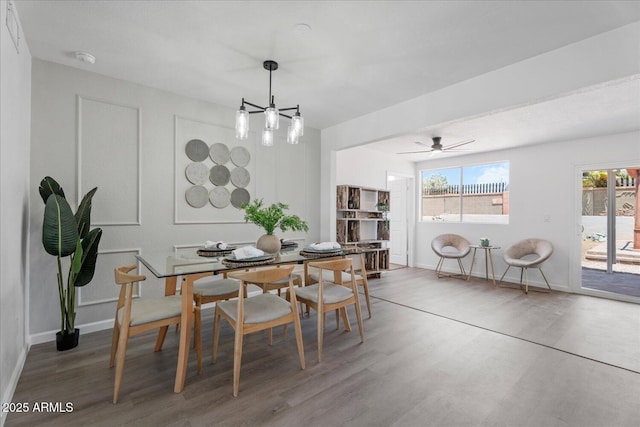 1561 N Sterling St, Mesa, AZ 85207 - dining area featuring wood finished floors and a chandelier