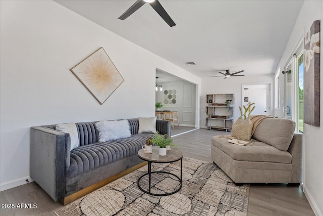 1561 N Sterling St, Mesa, AZ 85207 - living area with a ceiling fan and wood finished floors