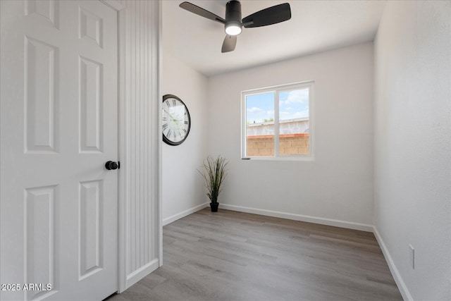 1561 N Sterling St, Mesa, AZ 85207 - empty room with wood finished floors and a ceiling fan