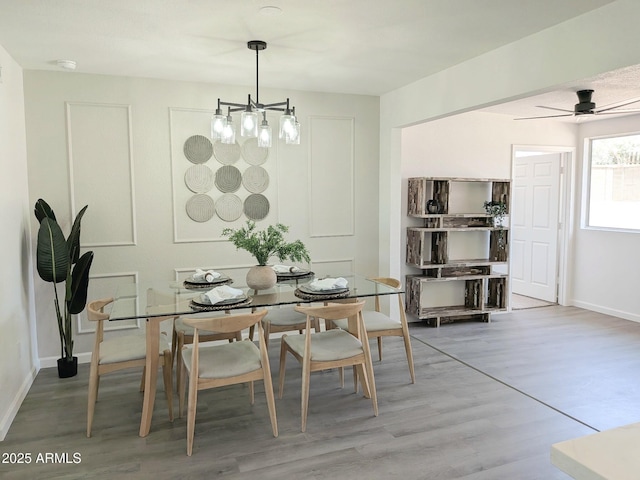 1561 N Sterling St, Mesa, AZ 85207 - dining area featuring a chandelier and wood finished floors